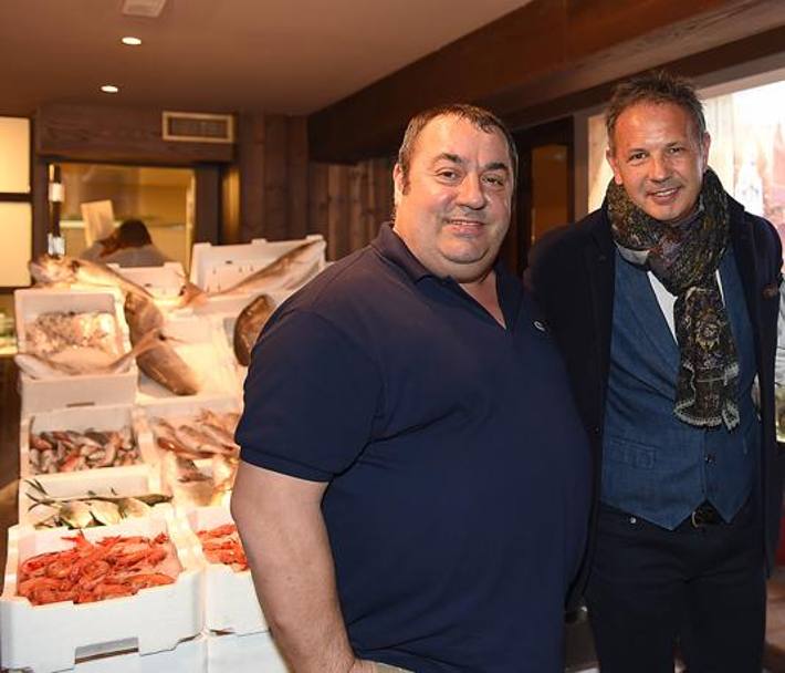 L&#39;allenatore del Milan, Sinisa Mihajlović, con il proprietario del ristorante Assunta Madre di Milano. Bozzani